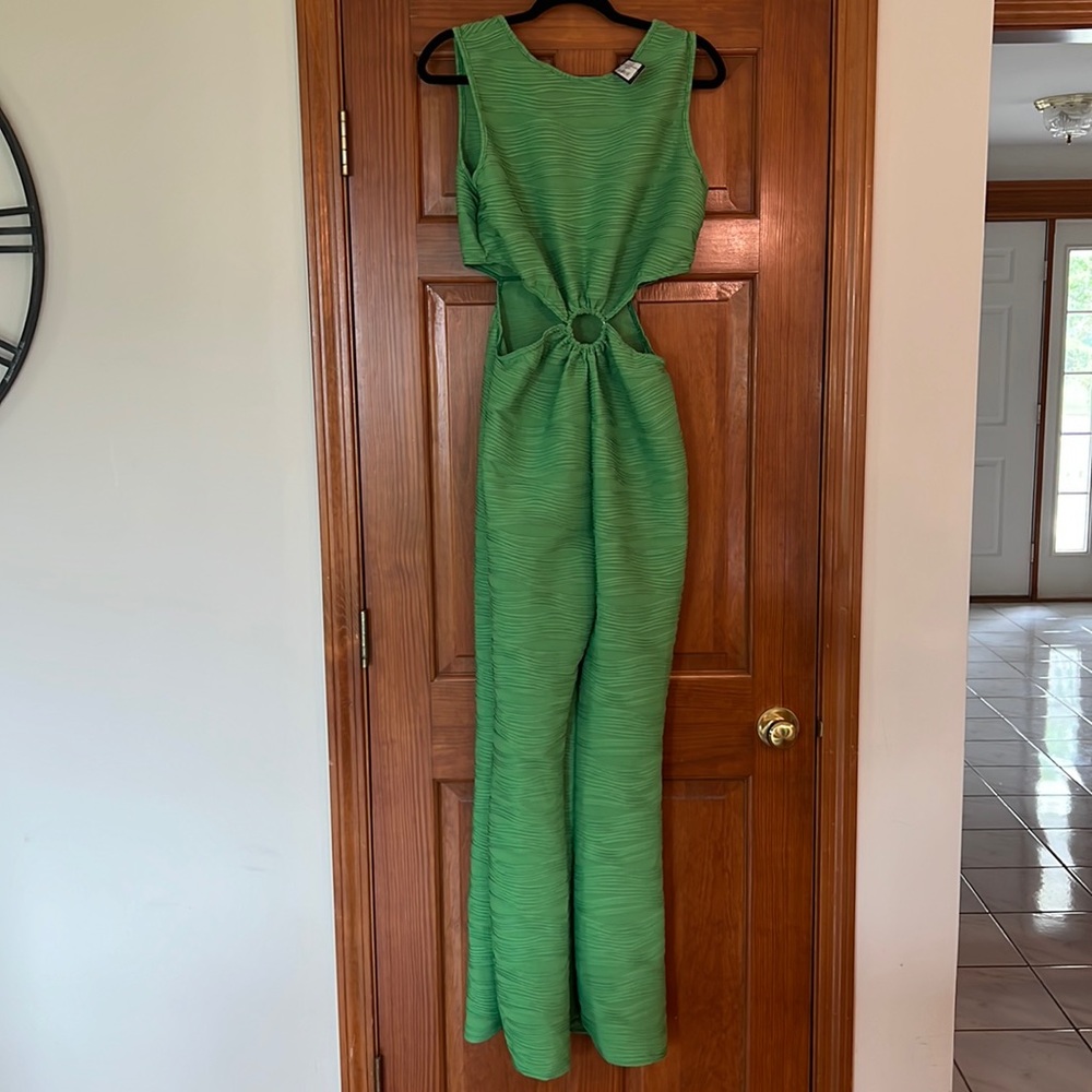 NWT. Pretty little thing green US 14 cut out jumpsuit. Smoke free.